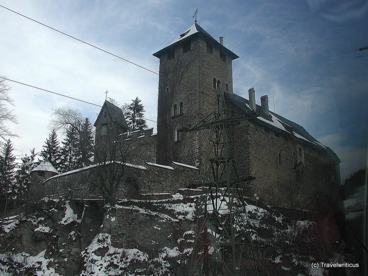 View of Wiesberg Castle in Tobadill from train